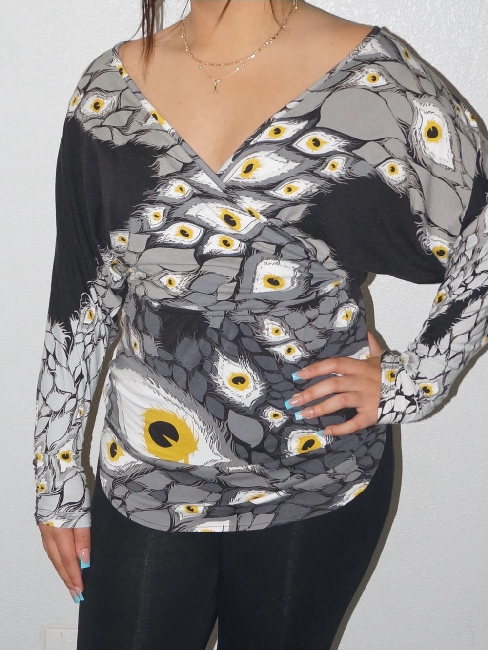 V-Neck Black & Gray Eye-Print Wrap Tunic with Yellow Accents